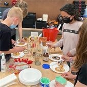 Tweens decorate cookies