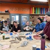 Adult crafters doing macrame