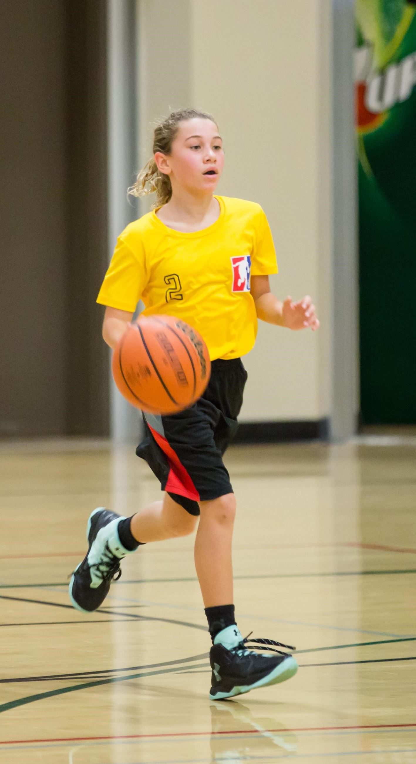 Girl playing basketball