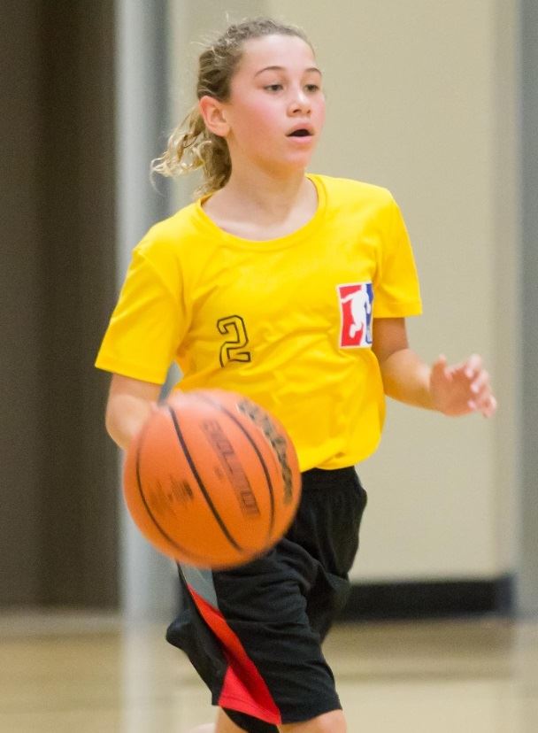 Girl playing basketball