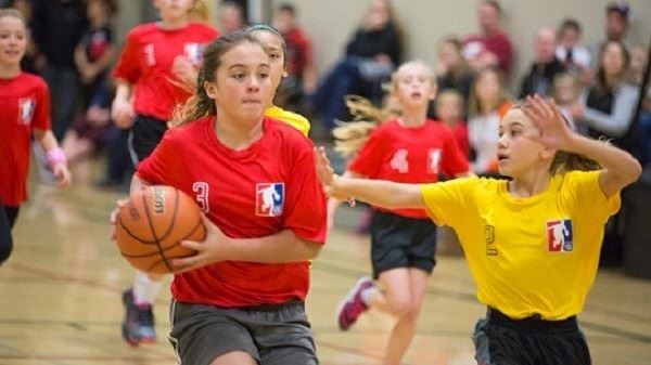 Girls playing in the Youth Basketball League